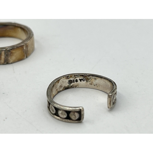 2055 - Seven .925 silver and white metal rings - approx. gross weight 23g