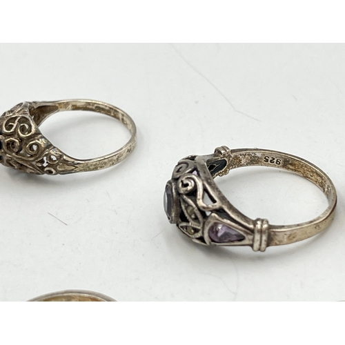 2055 - Seven .925 silver and white metal rings - approx. gross weight 23g