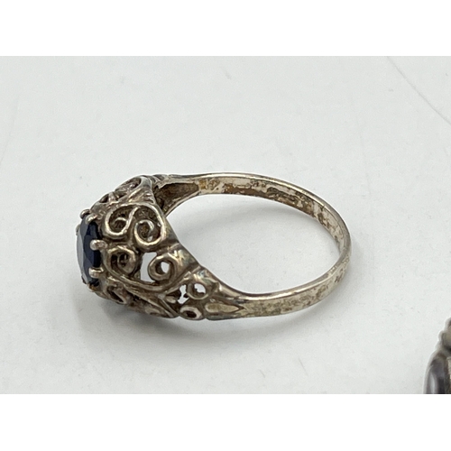 2055 - Seven .925 silver and white metal rings - approx. gross weight 23g