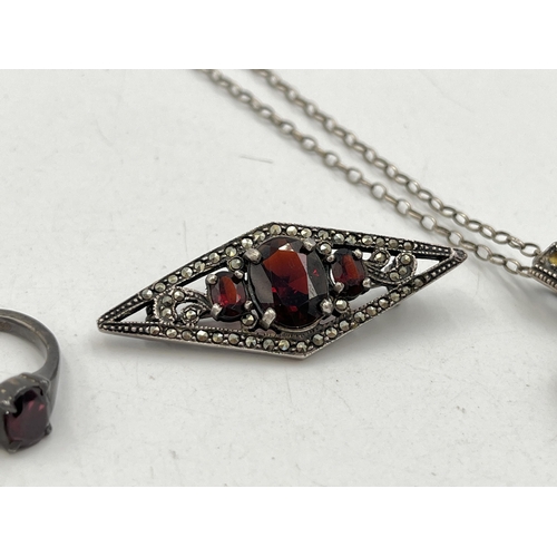 2059 - Three pieces of .925 silver and garnet jewellery, one hallmarked Birmingham solitaire ring, size N½,... 