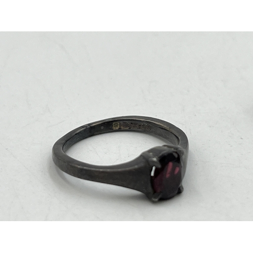 2059 - Three pieces of .925 silver and garnet jewellery, one hallmarked Birmingham solitaire ring, size N½,... 