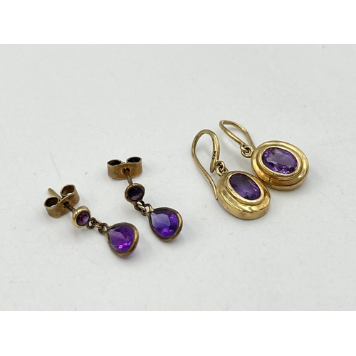 2060 - Two pairs of 9ct gold amethyst drop earrings - approx. gross weight 2.6g