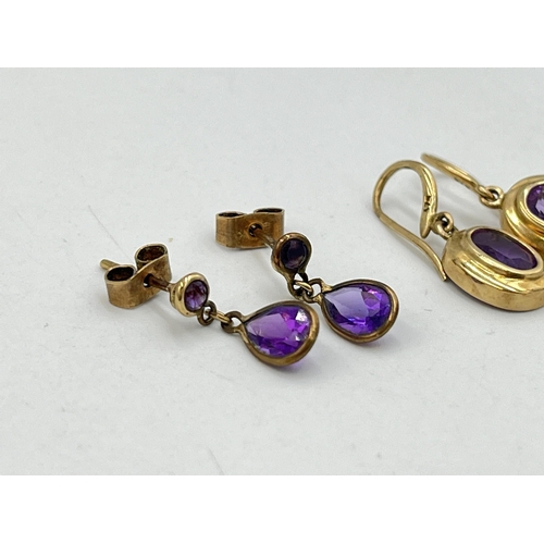 2060 - Two pairs of 9ct gold amethyst drop earrings - approx. gross weight 2.6g