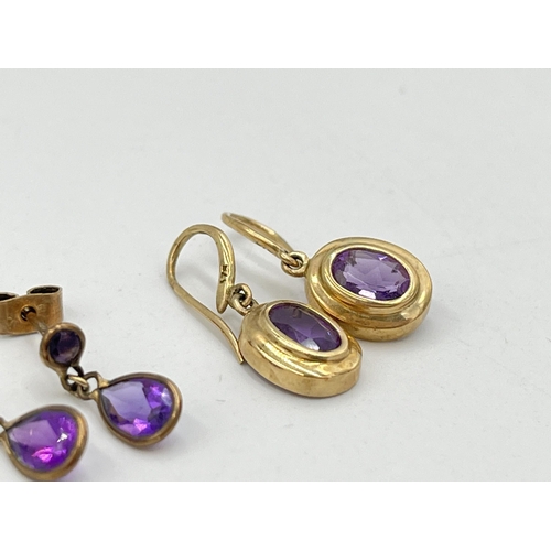 2060 - Two pairs of 9ct gold amethyst drop earrings - approx. gross weight 2.6g