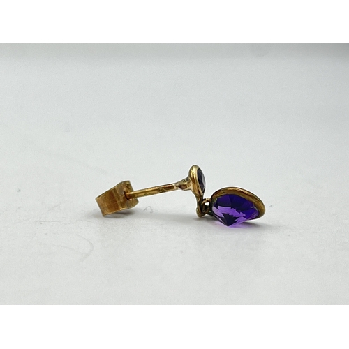 2060 - Two pairs of 9ct gold amethyst drop earrings - approx. gross weight 2.6g