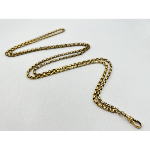 2061 - A Victorian yellow metal muff chain - approx. gross weight 45g and 65cm long