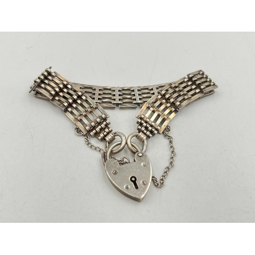 2081 - A J. A. Main hallmarked Birmingham sterling silver bracelet with heart shaped padlock clasp, dated 1... 