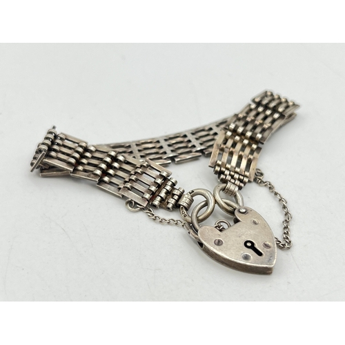 2081 - A J. A. Main hallmarked Birmingham sterling silver bracelet with heart shaped padlock clasp, dated 1... 