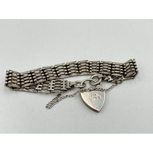 2081 - A J. A. Main hallmarked Birmingham sterling silver bracelet with heart shaped padlock clasp, dated 1... 