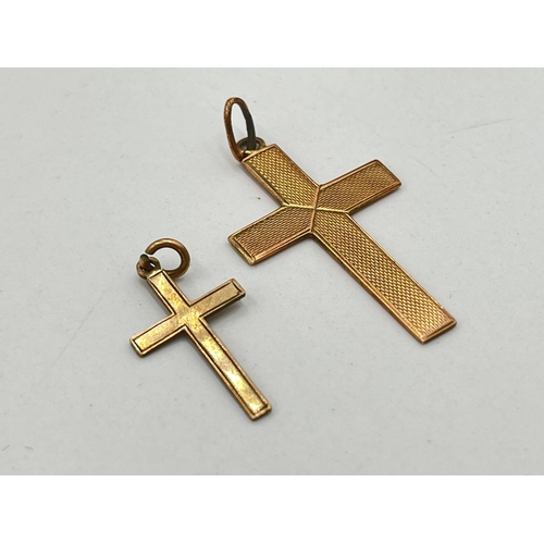 2086 - Two 9ct gold cross pendants - approx. gross weight 2.1g