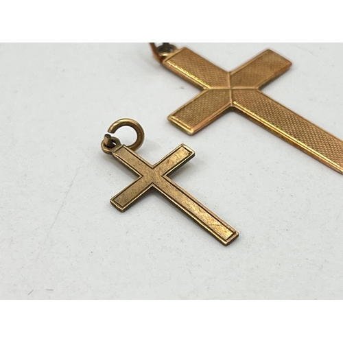 2086 - Two 9ct gold cross pendants - approx. gross weight 2.1g