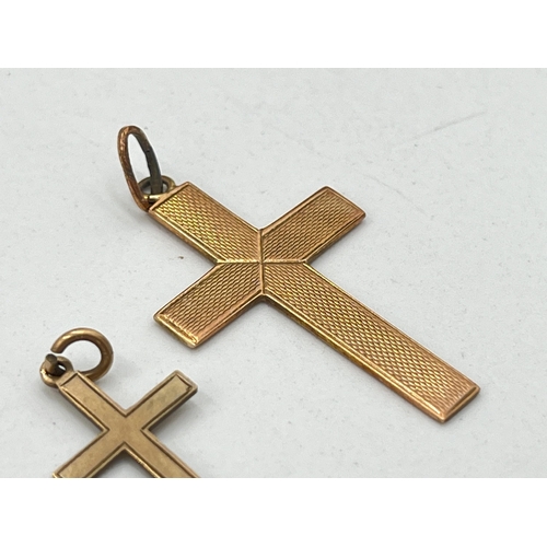 2086 - Two 9ct gold cross pendants - approx. gross weight 2.1g