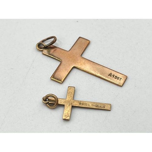 2086 - Two 9ct gold cross pendants - approx. gross weight 2.1g