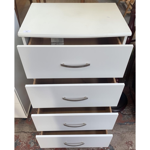 127 - A modern white laminate chest of drawers - approx. 99cm high x 60cm wide x 43cm deep