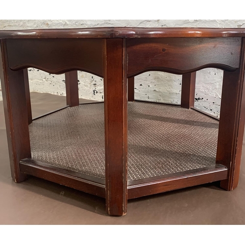 131 - A late 20th century mahogany and smoked glass octagonal serpentine coffee table - approx. 39cm high ... 