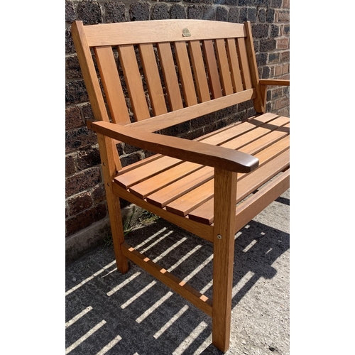 142 - A Rowlinson Garden Products Ltd teak garden bench with side table - approx. 91cm high x 120cm wide x... 