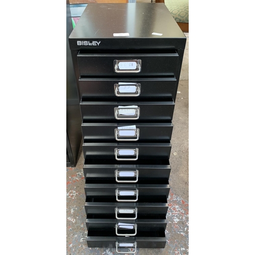 165 - A Bisley black metal ten drawer office filing cabinet - approx. 59.5cm high x 28cm wide x 48cm deep