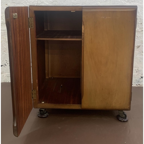 55 - A mid 20th century walnut two door record cabinet - approx. 62cm high x 53cm wide x 46cm deep