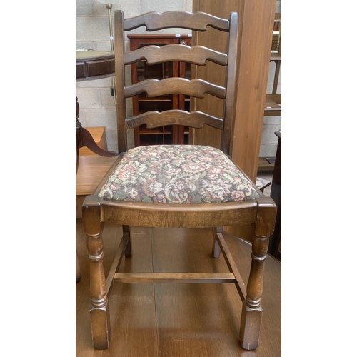 56 - A Priory oak drop leaf gate leg dining table and four ladder back chairs - approx. 76cm high x 112cm... 