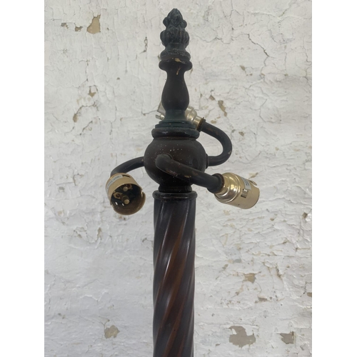 60 - A 19th century style bronzed cast metal twisted standard lamp on circular footed base - approx. 170c... 