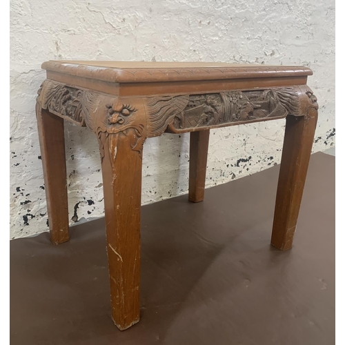 62 - A Chinese carved hardwood side table - approx. 47cm high x 40cm wide x 53cm long