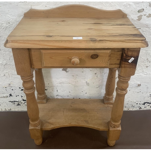 63 - A Victorian style pine single drawer two tier side table - approx. 82cm high x 61cm wide x 34cm deep