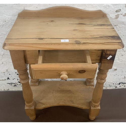 63 - A Victorian style pine single drawer two tier side table - approx. 82cm high x 61cm wide x 34cm deep