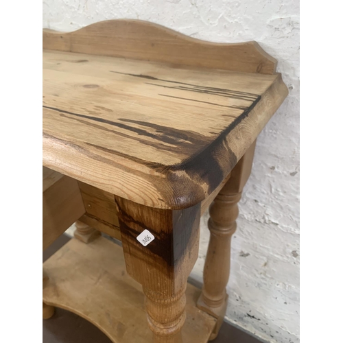 63 - A Victorian style pine single drawer two tier side table - approx. 82cm high x 61cm wide x 34cm deep