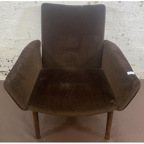 67 - A mid 20th century Parker Knoll PK908/9/10 teak and brown fabric upholstered armchair