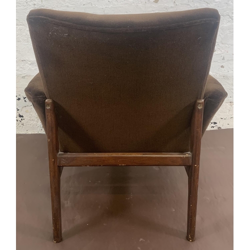 67 - A mid 20th century Parker Knoll PK908/9/10 teak and brown fabric upholstered armchair