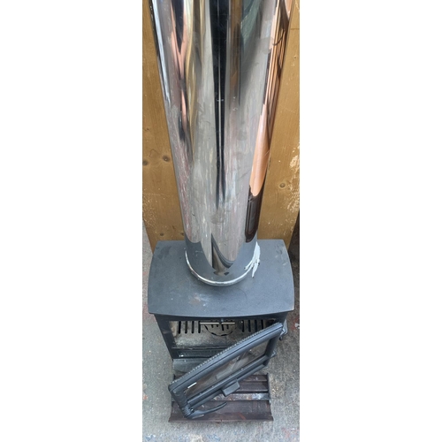 76 - A Fireline cast iron freestanding stove with Duoten 1000mm conduit - approx. 197cm high