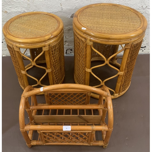 77 - Three pieces of wicker and cane furniture, two circular side tables and one magazine rack