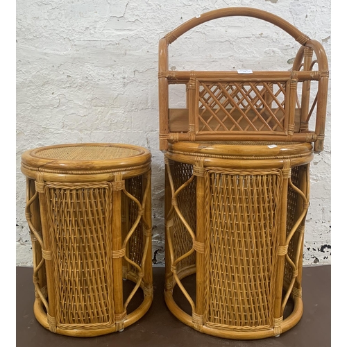 77 - Three pieces of wicker and cane furniture, two circular side tables and one magazine rack