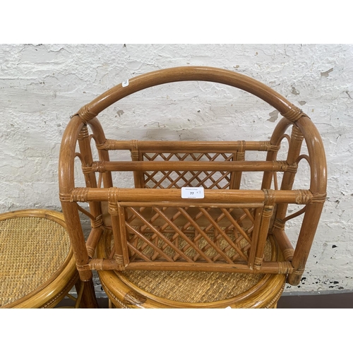 77 - Three pieces of wicker and cane furniture, two circular side tables and one magazine rack