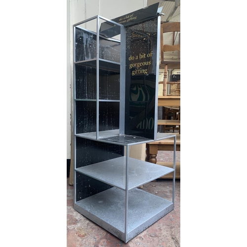 78 - A modern plastic and metal shop display shelving unit - approx. 160cm high x 60cm wide x 60cm deep