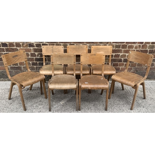 81 - Seven mid 20th century beech and plywood stacking chairs