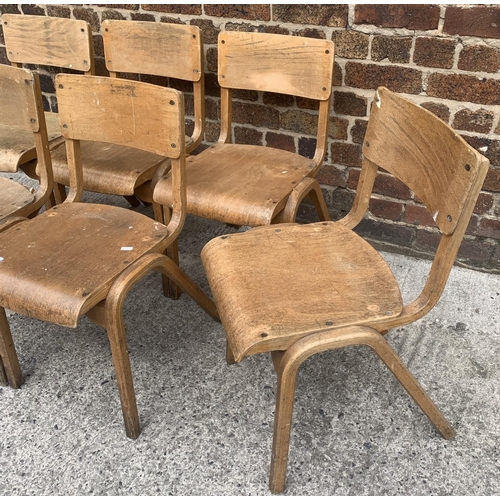 81 - Seven mid 20th century beech and plywood stacking chairs