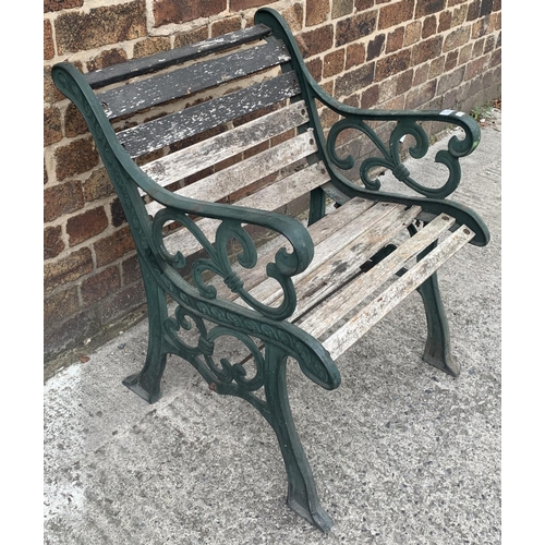 83 - A cast iron and wooden slatted garden armchair - approx. 78cm high x 62cm wide x 60cm deep