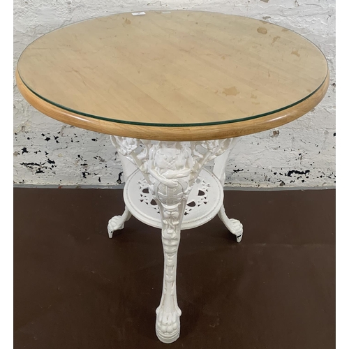 84 - A Victorian white painted cast iron Britannia pub table with later added beech circular top - approx... 