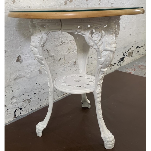 84 - A Victorian white painted cast iron Britannia pub table with later added beech circular top - approx... 