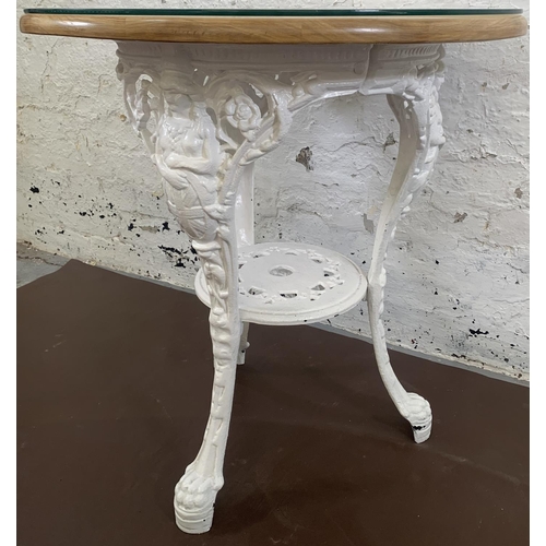 84 - A Victorian white painted cast iron Britannia pub table with later added beech circular top - approx... 