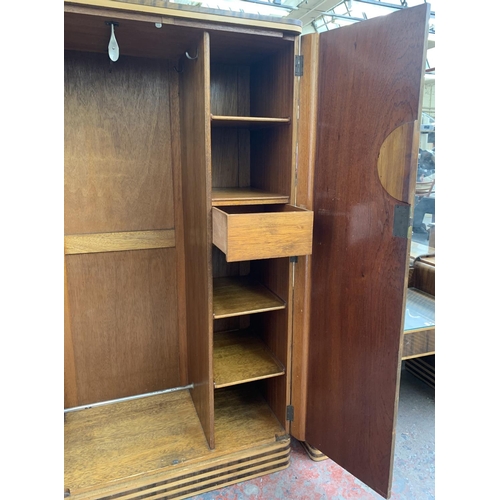 89 - A mid 20th century Art Deco style walnut and maple three piece bedroom suite