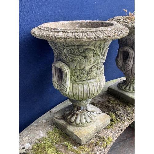 97 - A pair of cast stone urn pedestal garden planters - approx. 48cm high x 38cm diameter