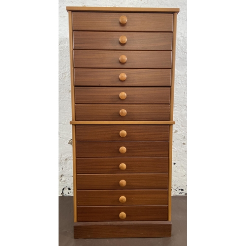 10 - A John Austin Furniture Ltd teak chest of drawers - approx. 111cm high x 51cm wide x 40cm deep