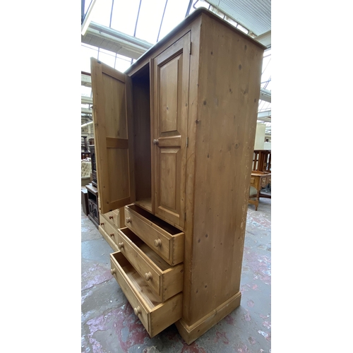 103 - A modern pine double wardrobe - approx. 183cm high x 91cm wide x 55cm deep