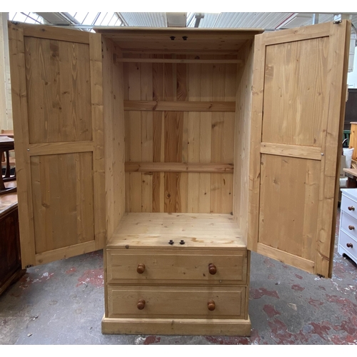 104 - A modern pine double wardrobe - approx. 177cm high x 90cm wide x 50cm deep