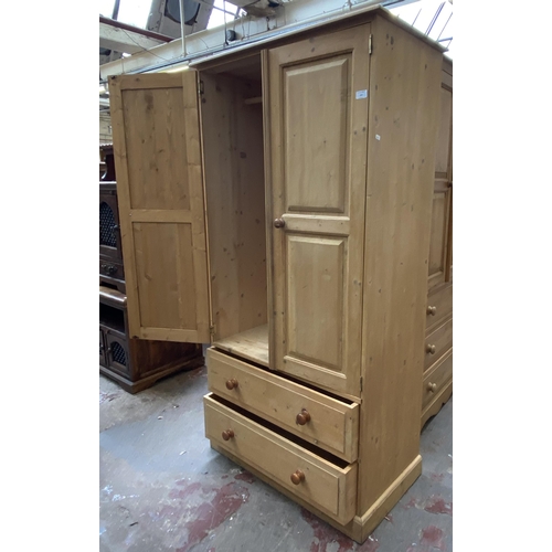 104 - A modern pine double wardrobe - approx. 177cm high x 90cm wide x 50cm deep