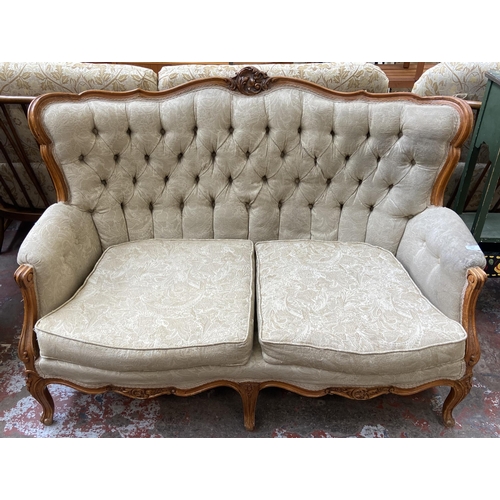 107 - A French Louis XV style carved beech and fabric upholstered two seater sofa - approx. 96cm high x 14... 