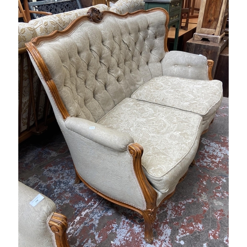 107 - A French Louis XV style carved beech and fabric upholstered two seater sofa - approx. 96cm high x 14... 