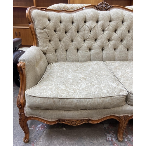 108 - A French Louis XV style carved beech and fabric upholstered two seater sofa - approx. 96cm high x 14... 